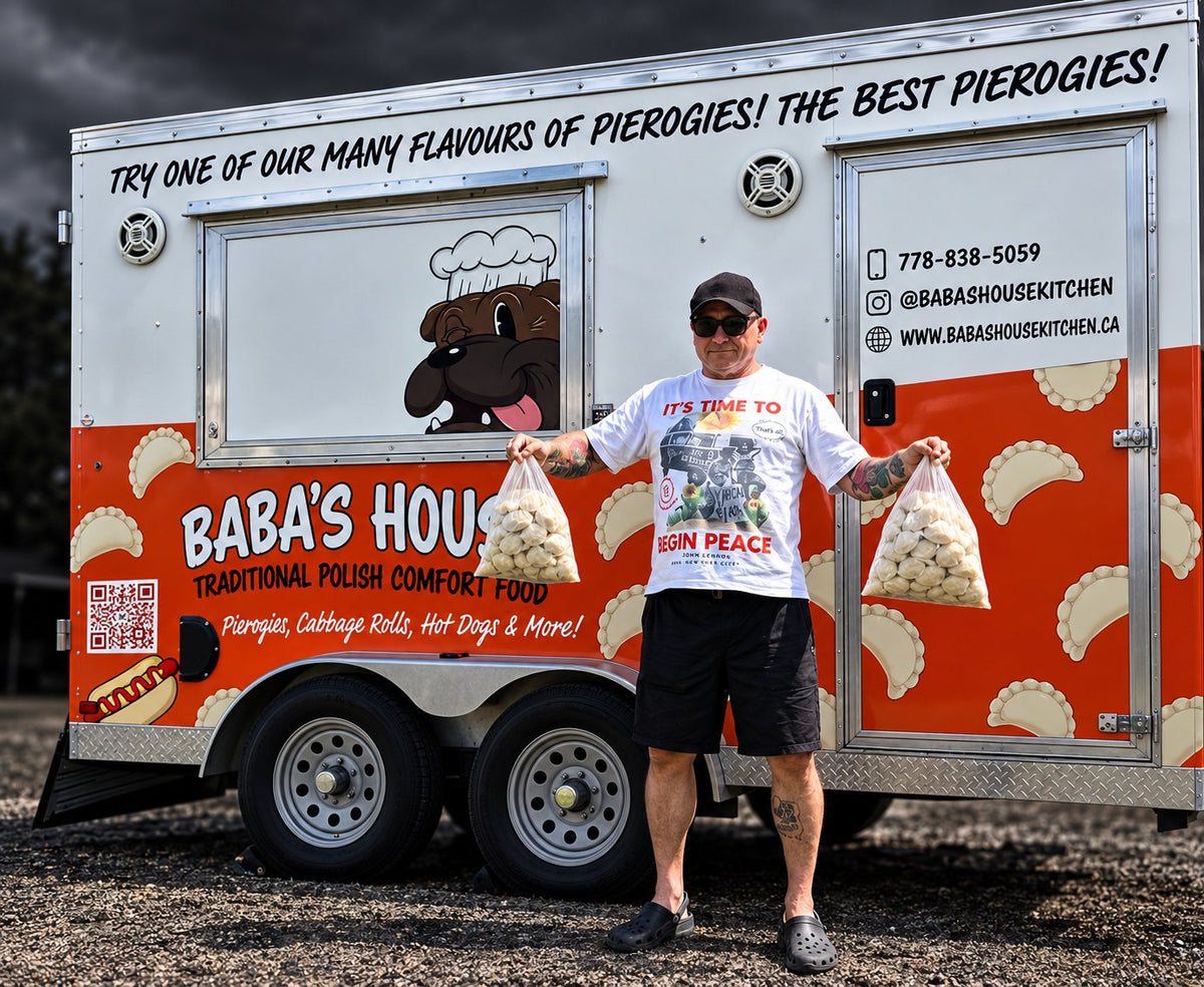 Man holding bags of pierogies in front of Baba’s House food truck